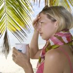 kranke Frau am Strand
